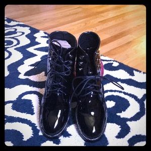 Black patent leather military style boot